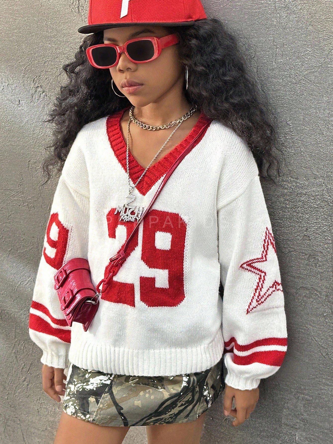 2026/03/1001146121.jpg Suéter con estampado en V - Imagen 1